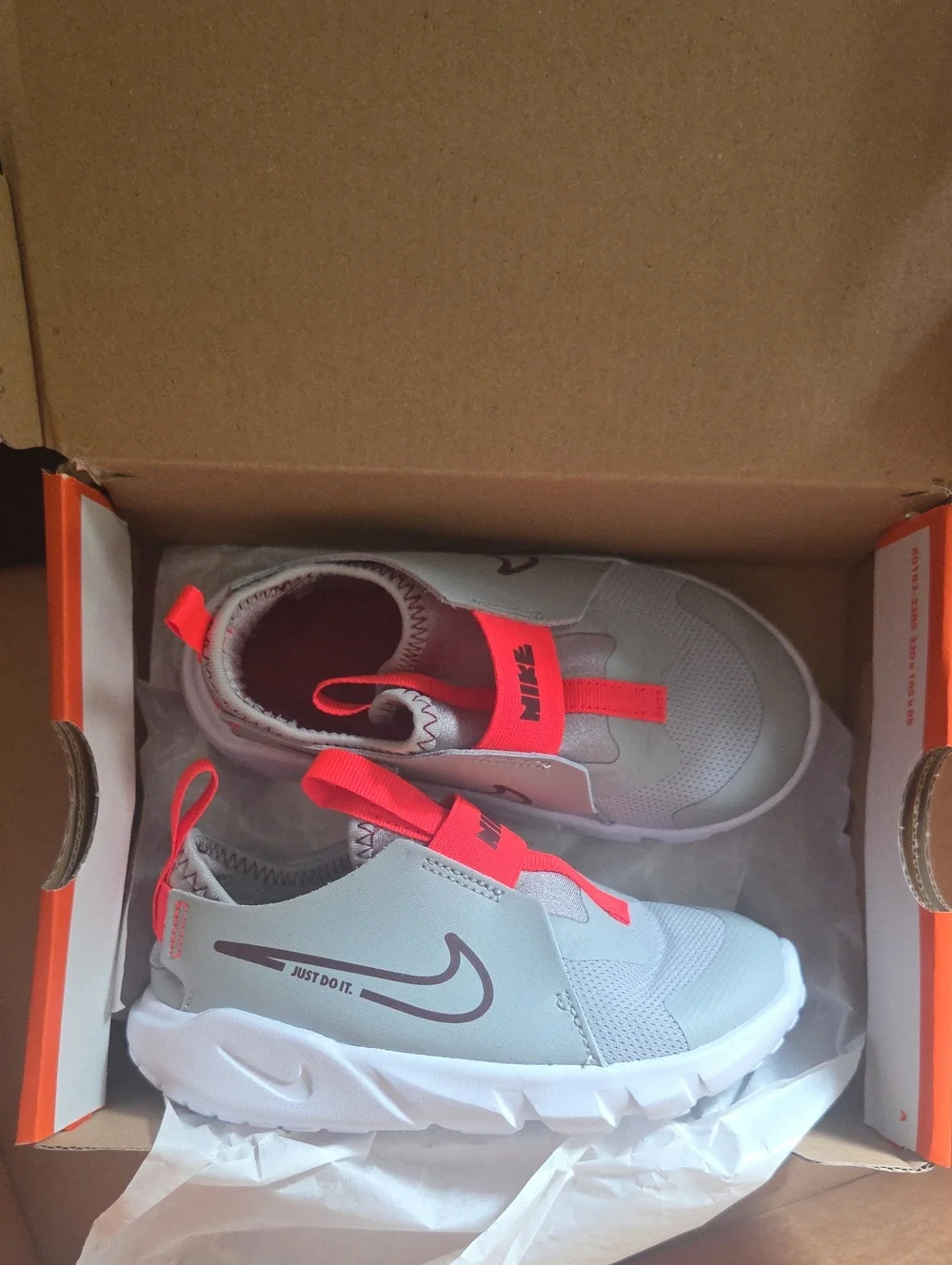 Nike Kids Gray and Neon Pink Slip-On Sneakers